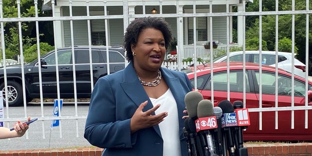 Democratic gubernatorial nominee Stacey Abrams speaks with reporters on the day of the Georgia primary, in Atlanta, on May 24, 2022.